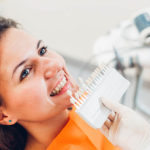 Woman at the dentist's office preparing to receive dental implants.